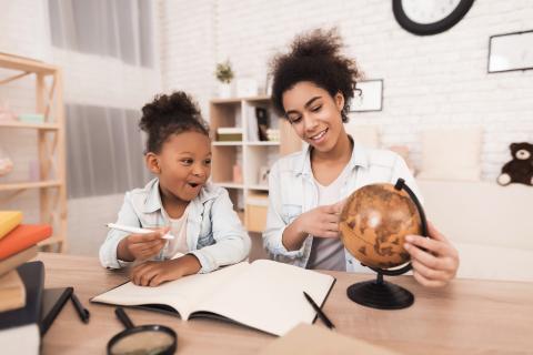 Picture of children learning at home.